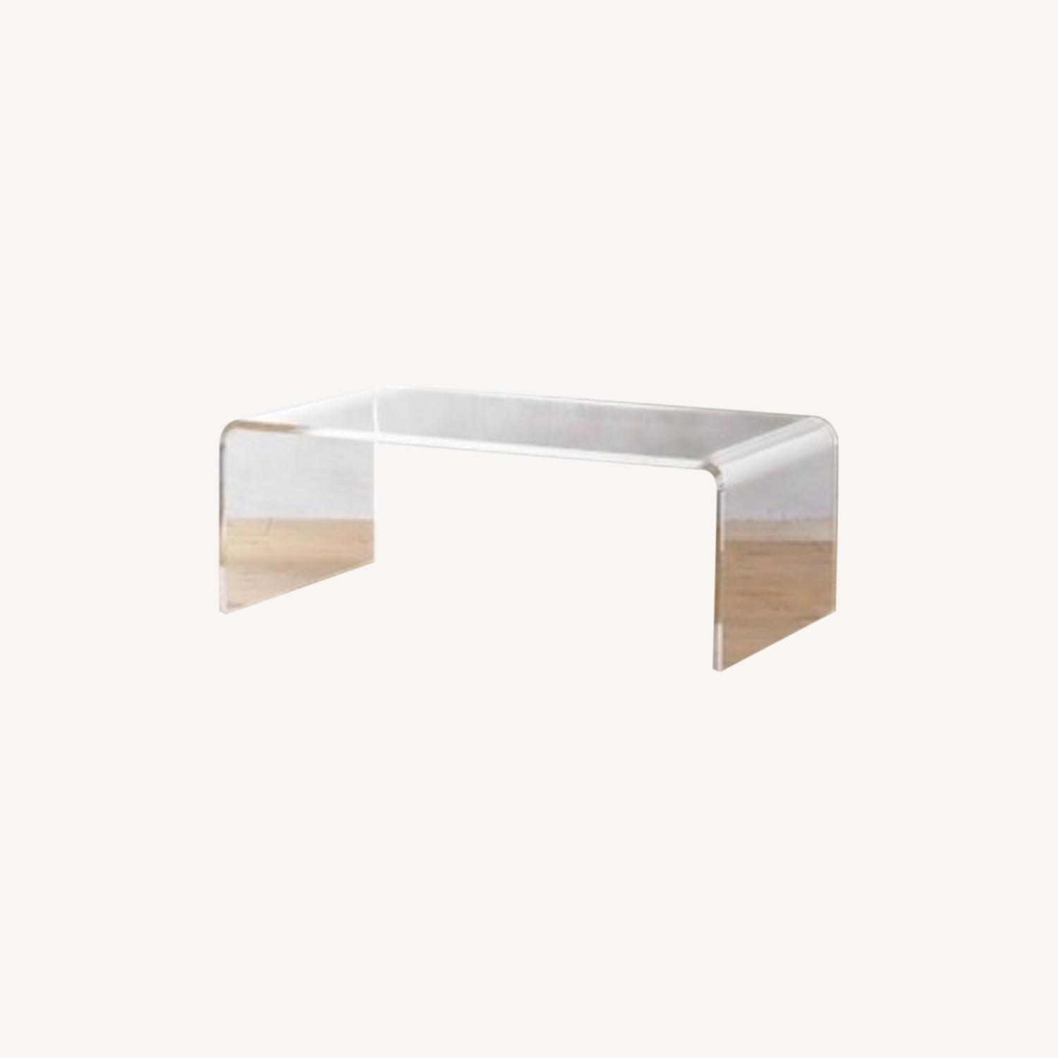 CB2 Peekaboo acrylic coffee table