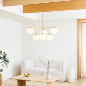 West Elm Sphere + Stem 6-Light Brass chandelier with opal globes